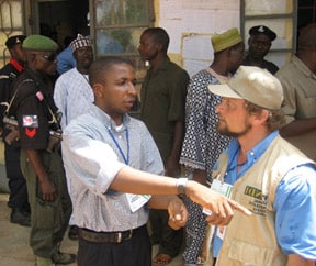 Dave Peterson, in tan vest, monitoring elections in Nigeria with the National Endowment for Democracy